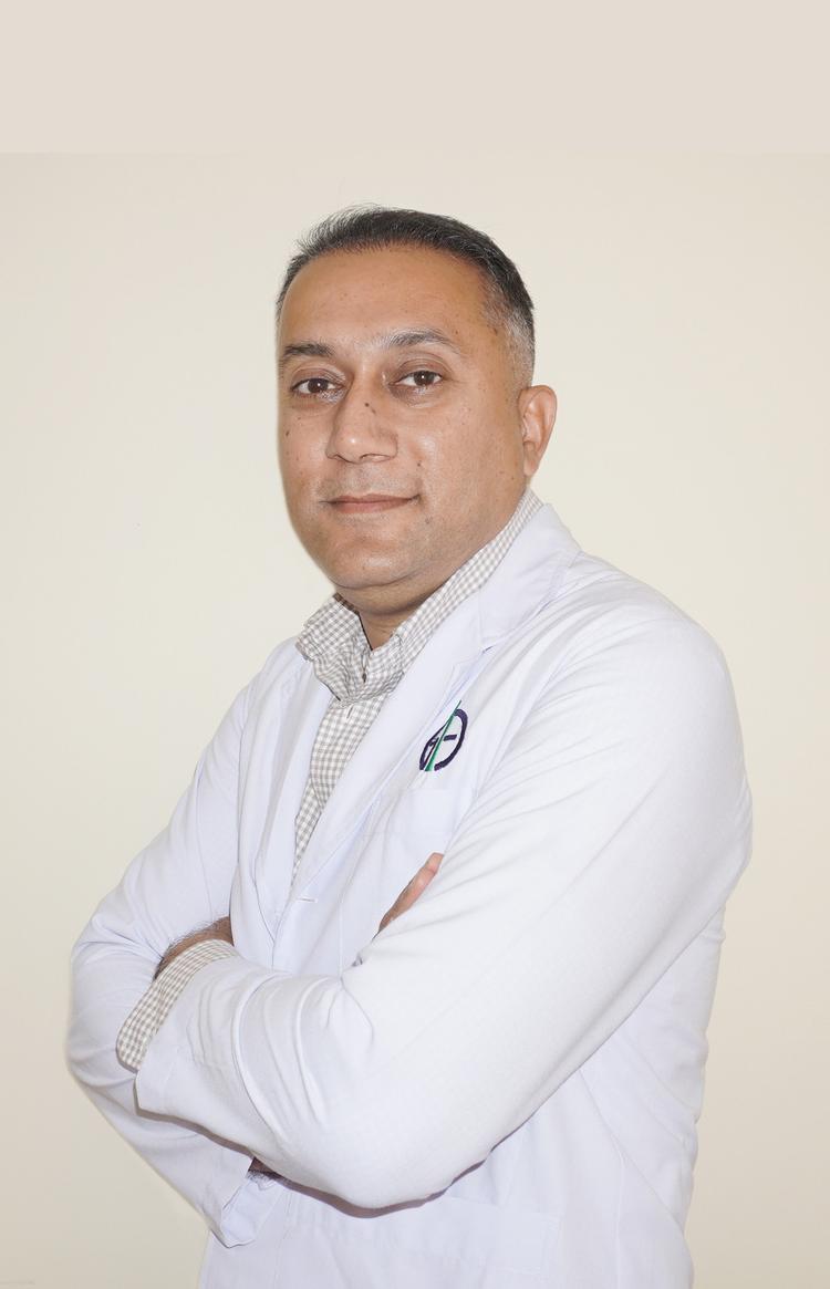 Dr. Kunjan Acharya
